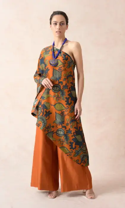 Squash color floral print chanderi silk one shoulder tunic with wide legged palazzo pants